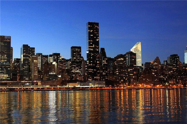 房子处于两栋楼之间的风水如何(两条路交叉口的房子 风水)